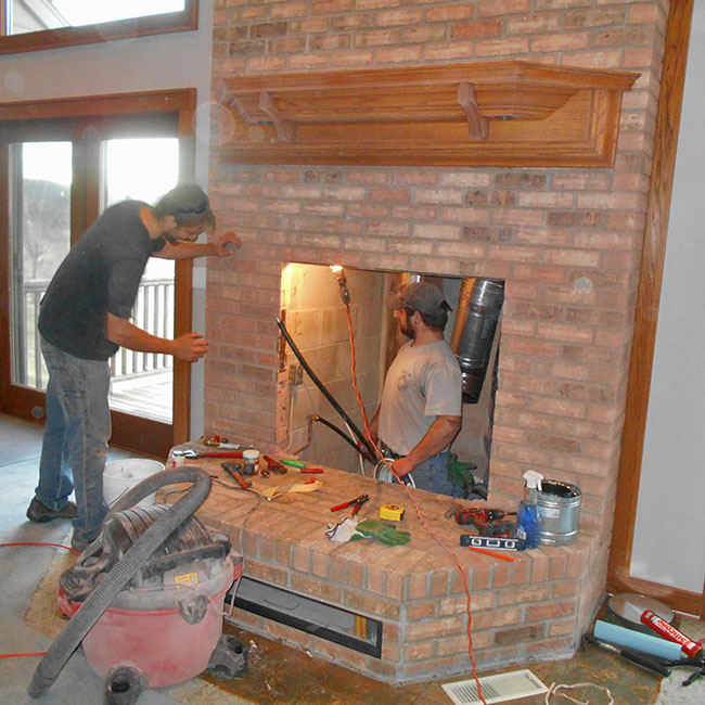 gas fireplace being repaired in WI