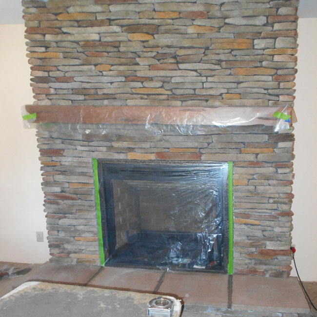 Great looking new wood fireplace and chimney in WI